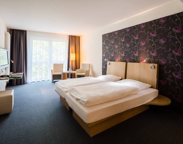 Hotelzimmer mit Doppelbett im Stadthotel Verden #1